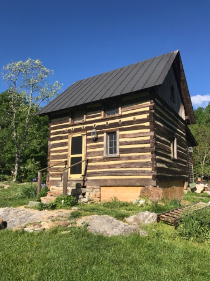 Chink Repair on Vintage Log Building Services 