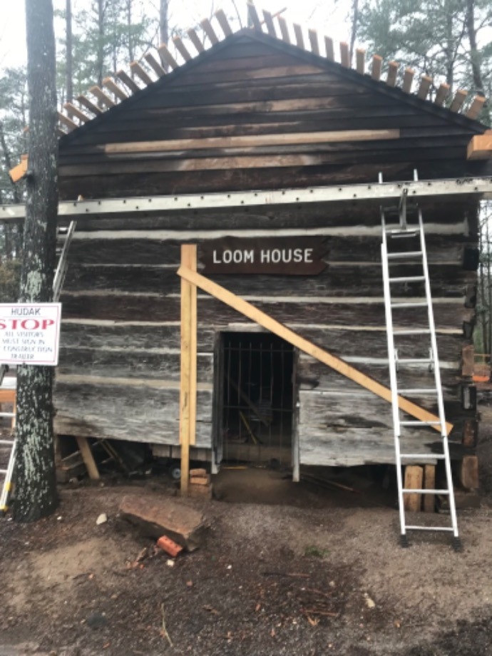 Chink Repair on Vintage Log Building Services 