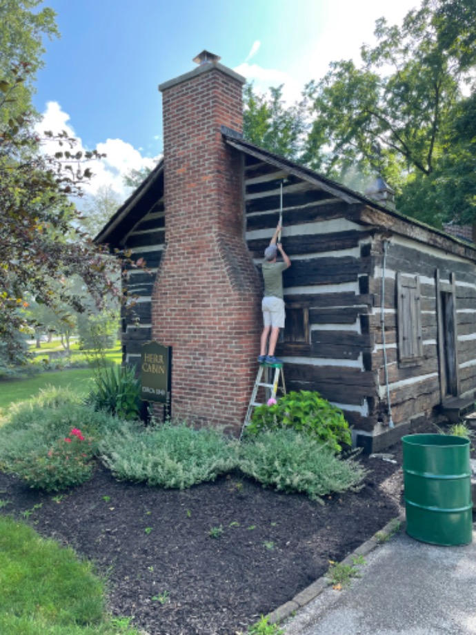 Chink Repair on Vintage Log Building Services 